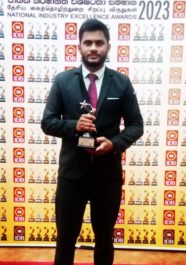 Milkiway representative receiving the National Industry Excellence Award 2023